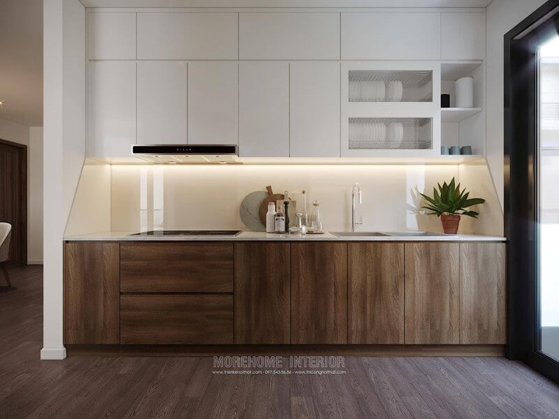 Tủ bếp dưới được làm từ gỗ công nghiệp, màu nâu trầm sang trọng, ngăn tủ cỡ lớn tạo sự thuận tiện cho việc cất, chứa đồ đạc của người nội trợ. Thiết kế phòng bếp, tủ bếp gỗ An Cường
