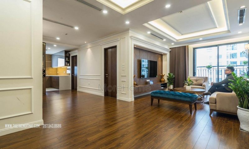 Để cải thiện không gian phòng khách của chung cư An Bình City, sàn nhựa giả gỗ bóng bẩy được sử dụng để nâng cấp.